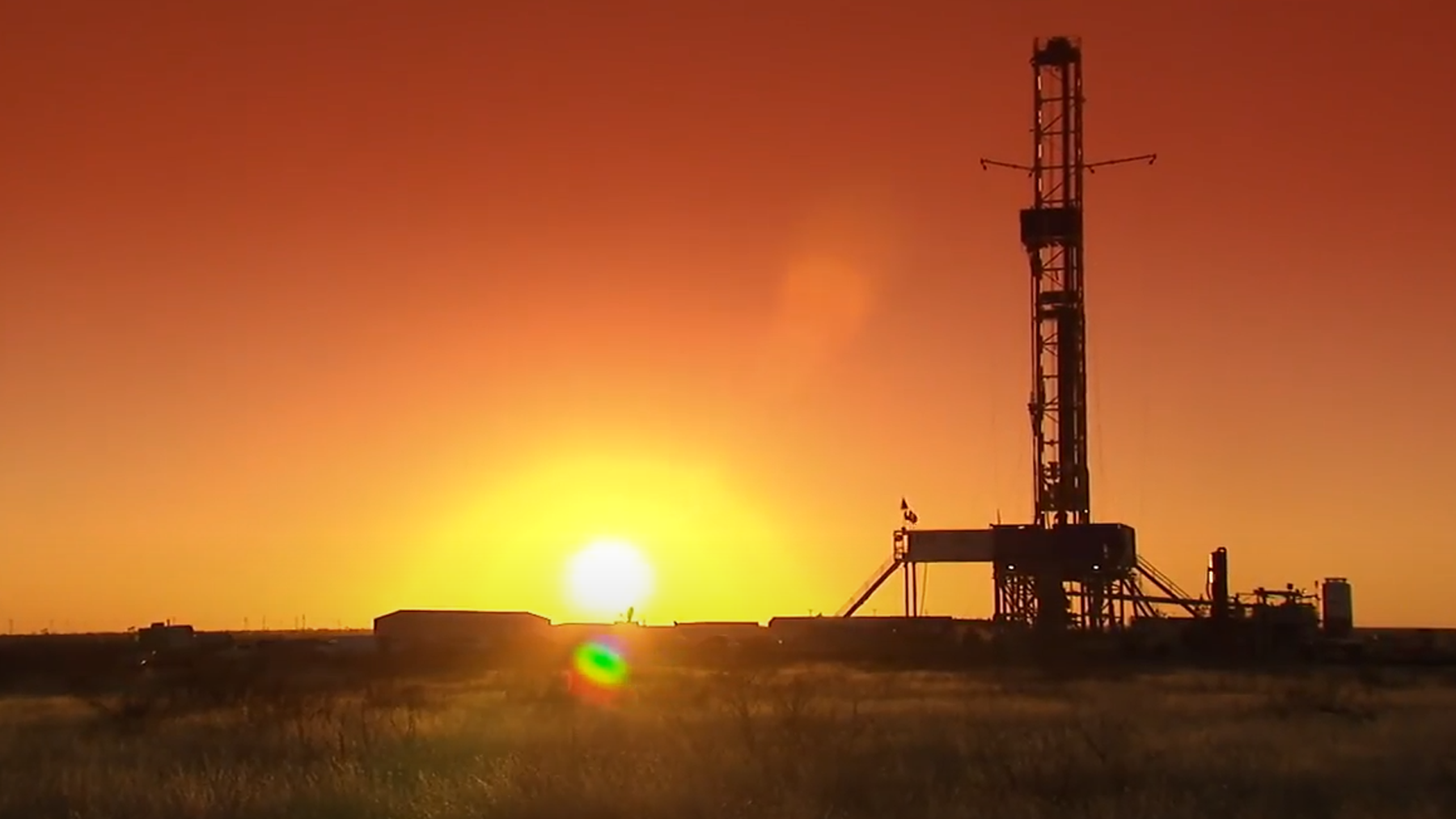 Oxy production rig at sunset